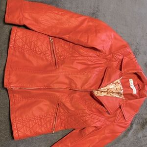 burt orangey pink leather jacket